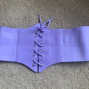 Purple lavender corset belt . Used once . Size medium . Has some cinching